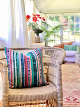 Vintage textile cushion made from a Guatemalan huipil and corte