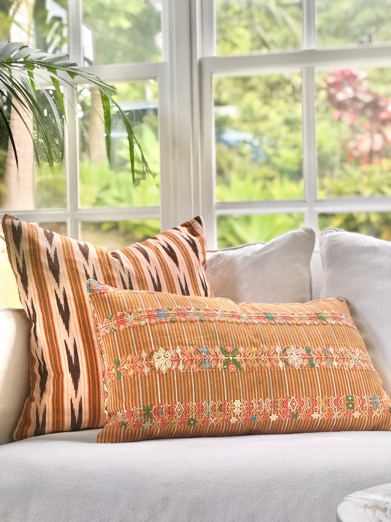 Vintage textile cushions made from a Guatemalan huipil and corte.