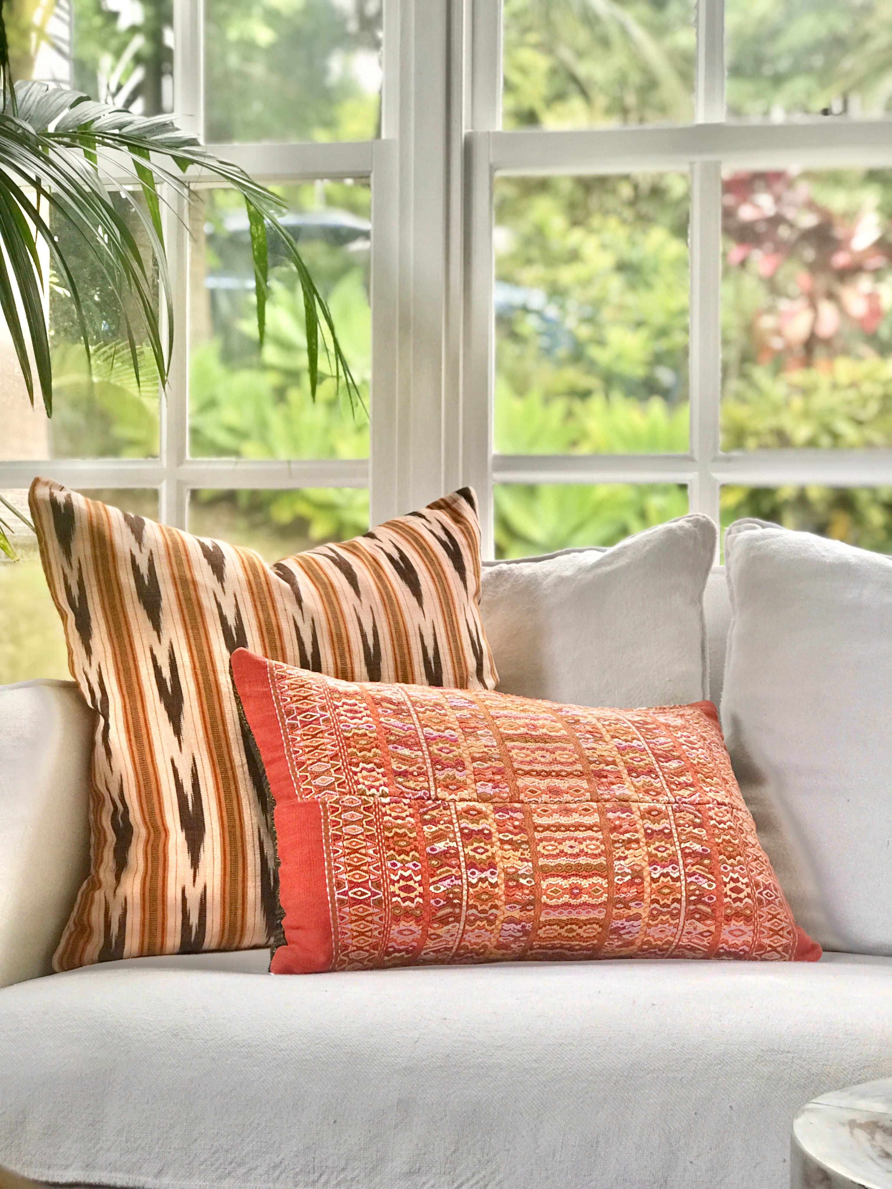 Vintage textile pillows made from a Guatemalan huipil and corte.