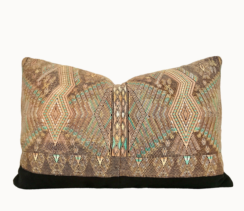 Embroidered Guatemalan huipil textile repurposed into a pillow