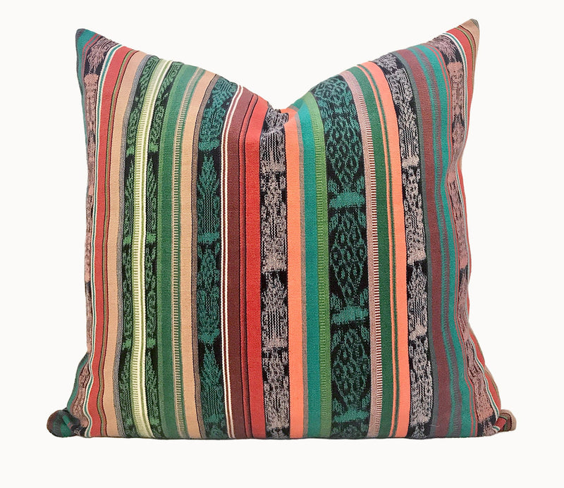 Vintage textile cushion made from a Guatemalan huipil and corte